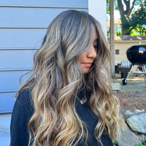 Major transformation! Full head of highlights but still an amazing grow out! 